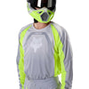 Fox Racing 180 Frame Jersey in Grey/Yellow, modeled front three-quarter view, with the crew neck, long sleeves, contrasting shoulder and arm graphics, and extended rear hem on a rider. Available options—Color: Blue, Grey/Yellow, Black, Red; Size: XS, SM, MD, LG, XL, 2X, 3X. SKU 40665-086-M. UPC 198571126073.