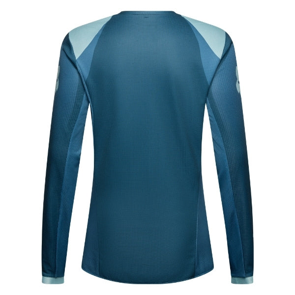Fox Racing 180 Frame Jersey (Womens) in Deep Blue, modeled front three-quarter view, with the crew neck, long sleeves, contrasting shoulder and arm graphics, and extended rear hem on a rider. Available options—Color: Neon Pink, Deep Blue; Size: XS, SM, MD, LG, XL. SKU 40668-E19-M. UPC 198571124819.