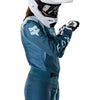 Fox Racing 180 Frame Jersey (Womens) in Deep Blue, close-up of the sleeve graphic and cuff, with the printed Fox artwork, mesh-knit texture, reinforced seam lines, and shaped cuff or hem. Available options—Color: Neon Pink, Deep Blue; Size: XS, SM, MD, LG, XL. SKU 40668-E19-XL. UPC 198571124833.