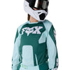 Fox Racing 180 Raid Jersey (Womens) in Melon, close-up of the chest and shoulder panels, with the printed Fox artwork, mesh-knit texture, reinforced seam lines, and shaped cuff or hem. Available options—Color: Lavender Drift, Melon; Size: XS, SM, MD, LG, XL. SKU 40669-413-L. UPC 198571127506.
