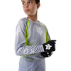 Fox Racing 180 Frame Jersey (Youth) in Grey/Yellow, close-up of the chest and shoulder panels, with the printed Fox artwork, mesh-knit texture, reinforced seam lines, and shaped cuff or hem. Available options—Color: Blue, Grey/Yellow, Black, Red; Size: Y-SM, Y-MD, Y-LG, Y-XL. SKU 40672-086-YXL. UPC 198571126141.