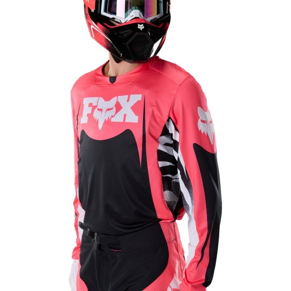 Fox Racing 360 Clutch Jersey in Neon Pink, close-up of the chest and shoulder panels, with the printed Fox artwork, mesh-knit texture, reinforced seam lines, and shaped cuff or hem. Available options—Color: White/Black, Neon Pink; Size: SM, MD, LG, XL, 2X. SKU 40678-065-XL. UPC 198571128008.