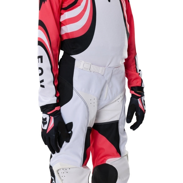 Fox Racing 180 Draft Pants (Youth) in White, close-up of the waist and hip panels, with the ratcheting waist adjuster, stretch yoke, shaped hip panel, and reinforced knee or thigh material. Available options—Color: White, Sunburst; Size: Y-22, Y-24, Y-26, Y-28. SKU 40683-008-26. UPC 198571132265.