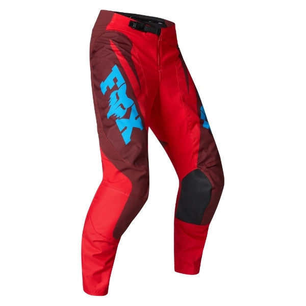 Fox Racing 180 Raid Pants in Rust, front product view, with the adjustable waist, articulated knees, contrasting leg graphics, reinforced inner knees, and tapered cuffs. Available options—Color: Rust, Purple Lava, Deep Fern; Size: 28, 30, 32, 34, 36, 38. SKU 40685-180-28. UPC 198571130896.