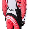 Fox Racing 180 Draft Pants in White, close-up of the ratcheting waist closure, with the ratcheting waist adjuster, stretch yoke, shaped hip panel, and reinforced knee or thigh material. Available options—Color: White, Black, Sunburst; Size: 28, 30, 32, 34, 36, 38. SKU 40687-008-34. UPC 198571132173.