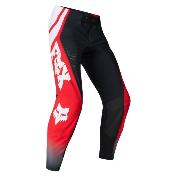 Fox Racing Flexair Thorn Pants in Red, front product view, with the adjustable waist, articulated knees, contrasting leg graphics, reinforced inner knees, and tapered cuffs. Available options—Color: Black/White, Purple Lava, Red; Size: 28, 30, 32, 34, 36, 38. SKU 40688-003-28. UPC 198571130223.