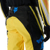 Fox Racing Flexair Arc Pants in Yellow, close-up of the ratcheting waist closure, with the ratcheting waist adjuster, stretch yoke, shaped hip panel, and reinforced knee or thigh material. Available options—Color: Yellow, Ice Blue, Chili; Size: 28, 30, 32, 34, 36, 38. SKU 40689-005-34. UPC 198571132920.