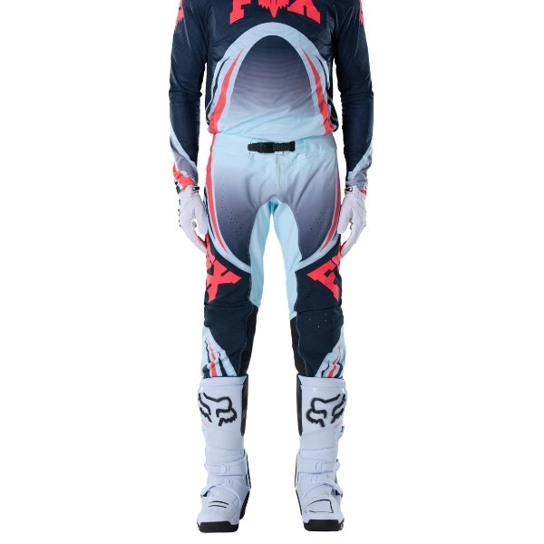Fox Racing Flexair Arc Pants in Ice Blue, close-up of the side thigh and knee panels, with the ratcheting waist adjuster, stretch yoke, shaped hip panel, and reinforced knee or thigh material. Available options—Color: Yellow, Ice Blue, Chili; Size: 28, 30, 32, 34, 36, 38. SKU 40689-231-36. UPC 198571126523.