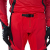 Fox Racing Flexair Arc Pants in Chili, close-up of the waist and hip panels, with the ratcheting waist adjuster, stretch yoke, shaped hip panel, and reinforced knee or thigh material. Available options—Color: Yellow, Ice Blue, Chili; Size: 28, 30, 32, 34, 36, 38. SKU 40689-555-32. UPC 198571124451.