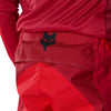 Fox Racing Flexair Arc Pants in Chili, close-up of the ratcheting waist closure, with the ratcheting waist adjuster, stretch yoke, shaped hip panel, and reinforced knee or thigh material. Available options—Color: Yellow, Ice Blue, Chili; Size: 28, 30, 32, 34, 36, 38. SKU 40689-555-34. UPC 198571124468.