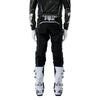 Fox Racing Flexair Apex Pants in Black, rear lower-leg and cuff view, with the reinforced seat, rear yoke, articulated knees, tapered legs, and lower-leg graphics. Available options—Color: Black; Size: 28, 30, 32, 34, 36, 38. SKU 40690-001-38. UPC 198571133620.