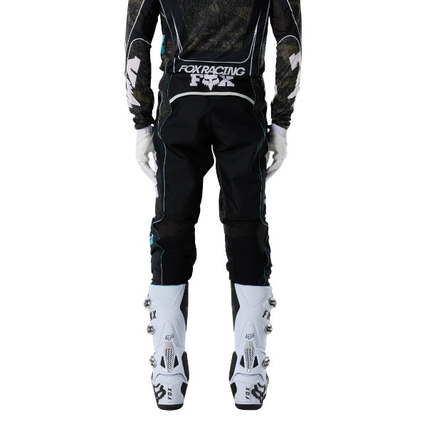 Fox Racing Flexair Apex Pants in Black, rear lower-leg and cuff view, with the reinforced seat, rear yoke, articulated knees, tapered legs, and lower-leg graphics. Available options—Color: Black; Size: 28, 30, 32, 34, 36, 38. SKU 40690-001-38. UPC 198571133620.