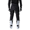 Fox Racing 180 Blackout Pants in Black, rear lower-leg and cuff view, with the reinforced seat, rear yoke, articulated knees, tapered legs, and lower-leg graphics. Available options—Color: Black; Size: 26, 28, 30, 32, 34, 36, 38, 40, 42, 44. SKU 40693-001-36. UPC 198571121979.