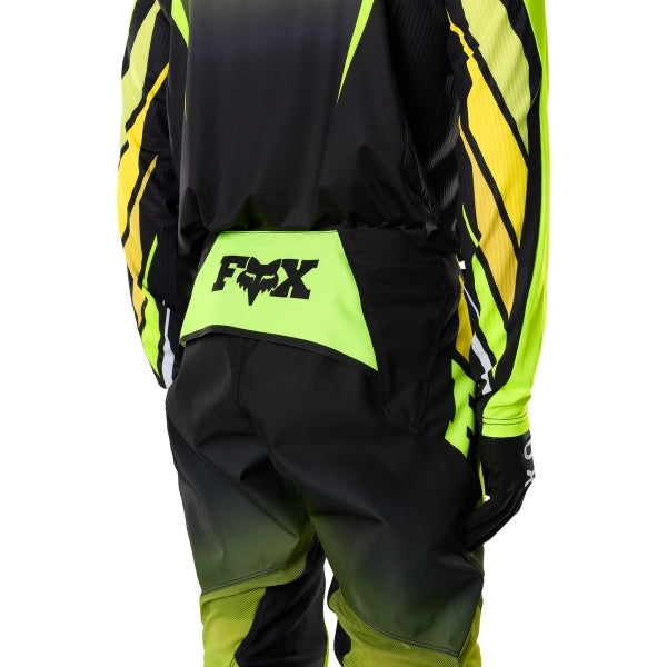 Fox Racing 360 Foundry Pants in HiViz Yellow, close-up of the ratcheting waist closure, with the ratcheting waist adjuster, stretch yoke, shaped hip panel, and reinforced knee or thigh material. Available options—Color: Black/Grey, Flo Red, Sky Blue, HiViz Yellow; Size: 28, 30, 32, 34, 36, 38. SKU 40695-A46-34. UPC 198571126349.