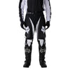 Fox Racing 180 Frame Pants in Black, close-up of the waist and hip panels, with the ratcheting waist adjuster, stretch yoke, shaped hip panel, and reinforced knee or thigh material. Available options—Color: Blue, Grey/Yellow, Black, Red; Size: 26, 28, 30, 32, 34, 36, 38, 40, 42, 44. SKU 40696-001-30. UPC 198571122112.