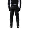 Fox Racing 180 Frame Pants in Black, close-up of the ratcheting waist closure, with the ratcheting waist adjuster, stretch yoke, shaped hip panel, and reinforced knee or thigh material. Available options—Color: Blue, Grey/Yellow, Black, Red; Size: 26, 28, 30, 32, 34, 36, 38, 40, 42, 44. SKU 40696-001-32. UPC 198571122129.
