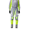 Fox Racing 180 Frame Pants in Grey/Yellow, close-up of the ratcheting waist closure, with the ratcheting waist adjuster, stretch yoke, shaped hip panel, and reinforced knee or thigh material. Available options—Color: Blue, Grey/Yellow, Black, Red; Size: 26, 28, 30, 32, 34, 36, 38, 40, 42, 44. SKU 40696-086-32. UPC 198571126011.