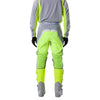 Fox Racing 180 Frame Pants in Grey/Yellow, close-up of the side thigh and knee panels, with the ratcheting waist adjuster, stretch yoke, shaped hip panel, and reinforced knee or thigh material. Available options—Color: Blue, Grey/Yellow, Black, Red; Size: 26, 28, 30, 32, 34, 36, 38, 40, 42, 44. SKU 40696-086-34. UPC 198571126028.