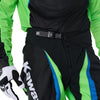 Fox Racing 180 Kawasaki Pants in Black, close-up of the waist and hip panels, with the ratcheting waist adjuster, stretch yoke, shaped hip panel, and reinforced knee or thigh material. Available options—Color: Black; Size: 26, 28, 30, 32, 34, 36, 38. SKU 40697-001-30. UPC 198571122044.