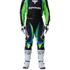 Fox Racing 180 Kawasaki Pants in Black, close-up of the side thigh and knee panels, with the ratcheting waist adjuster, stretch yoke, shaped hip panel, and reinforced knee or thigh material. Available options—Color: Black; Size: 26, 28, 30, 32, 34, 36, 38. SKU 40697-001-34. UPC 198571122068.