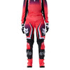 Fox Racing 180 Frame Pants (Womens) in Neon Pink, close-up of the side thigh and knee panels, with the ratcheting waist adjuster, stretch yoke, shaped hip panel, and reinforced knee or thigh material. Available options—Color: Neon Pink, Deep Blue; Size: 2, 4, 6, 8, 10, 12, 14, 16. SKU 40699-065-10. UPC 198571128183.