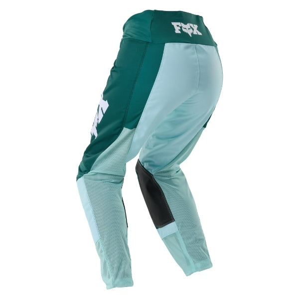 Fox Racing 180 Raid Pants (Womens) in Lavender Drift, full modeled rear view, with the reinforced seat, rear yoke, articulated knees, tapered legs, and lower-leg graphics. Available options—Color: Lavender Drift, Melon; Size: 2, 4, 6, 8, 10, 12, 14, 16. SKU 40700-F07-16. UPC 198571126905.