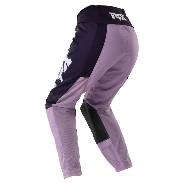 Fox Racing 180 Raid Pants (Womens) in Lavender Drift, rear product view, with the reinforced seat, rear yoke, articulated knees, tapered legs, and lower-leg graphics. Available options—Color: Lavender Drift, Melon; Size: 2, 4, 6, 8, 10, 12, 14, 16. SKU 40700-F07-4. UPC 198571126844.