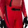 Fox Racing Flexair Arc Pants (Youth) in Chili, close-up of the side thigh and knee panels, with the ratcheting waist adjuster, stretch yoke, shaped hip panel, and reinforced knee or thigh material. Available options—Color: Ice Blue, Chili; Size: Y-22, Y-24, Y-26, Y-28.