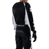 Fox Racing 180 Frame Pants (Youth) in Red, close-up of the ratcheting waist closure, with the ratcheting waist adjuster, stretch yoke, shaped hip panel, and reinforced knee or thigh material. Available options—Color: Blue, Grey/Yellow, Black, Red; Size: Y-22, Y-24, Y-26, Y-28. SKU 40702-003-28. UPC 198571130162.