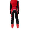 Fox Racing 180 Frame Pants (Youth) in Red, close-up of the ratcheting waist closure, with the ratcheting waist adjuster, stretch yoke, shaped hip panel, and reinforced knee or thigh material. Available options—Color: Blue, Grey/Yellow, Black, Red; Size: Y-22, Y-24, Y-26, Y-28.