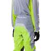 Fox Racing 180 Frame Pants (Youth) in Black, rear product view, with the reinforced seat, rear yoke, articulated knees, tapered legs, and lower-leg graphics. Available options—Color: Blue, Grey/Yellow, Black, Red; Size: Y-22, Y-24, Y-26, Y-28. SKU 40702-001-24. UPC 198571122792.