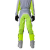 Fox Racing 180 Frame Pants (Youth) in Black, close-up of the ratcheting waist closure, with the ratcheting waist adjuster, stretch yoke, shaped hip panel, and reinforced knee or thigh material. Available options—Color: Blue, Grey/Yellow, Black, Red; Size: Y-22, Y-24, Y-26, Y-28. SKU 40702-001-28. UPC 198571122815.