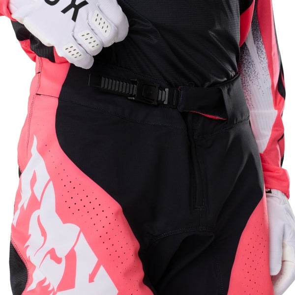 Fox Racing 360 Clutch Pants in Neon Pink, close-up of the waist and hip panels, with the ratcheting waist adjuster, stretch yoke, shaped hip panel, and reinforced knee or thigh material. Available options—Color: White/Black, Neon Pink; Size: 28, 30, 32, 34, 36, 38. SKU 40707-065-32. UPC 198571128046.