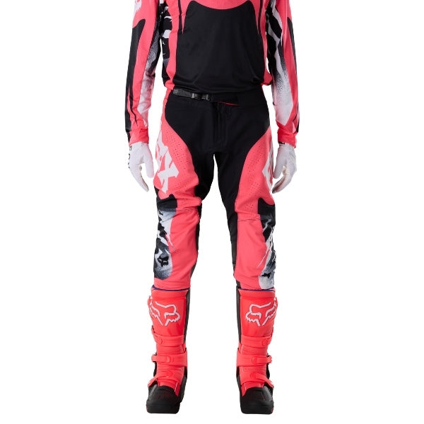Fox Racing 360 Clutch Pants in Neon Pink, close-up of the side thigh and knee panels, with the ratcheting waist adjuster, stretch yoke, shaped hip panel, and reinforced knee or thigh material. Available options—Color: White/Black, Neon Pink; Size: 28, 30, 32, 34, 36, 38. SKU 40707-065-36. UPC 198571128060.