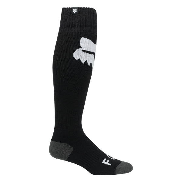 Fox Racing 180 Elevated Core Socks in Black, full side profile, with the ribbed cuff, knitted Fox graphics, shaped heel, reinforced toe, and ventilated stretch knit. Available options—Color: Black, Midnight, Red, Grey; Size: SM, MD, LG. SKU 40716-001-S. UPC 198571122440.