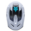 Fox Racing V1 Clutch Helmet in White/Black, top view, with the visor tip, crown vents, shell graphics, and central Fox logo. Available options—Color: Neon Pink, White/Black; Size: XS, SM, MD, LG, XL, 2X. SKU 42140-058-XL. UPC 198571132692.