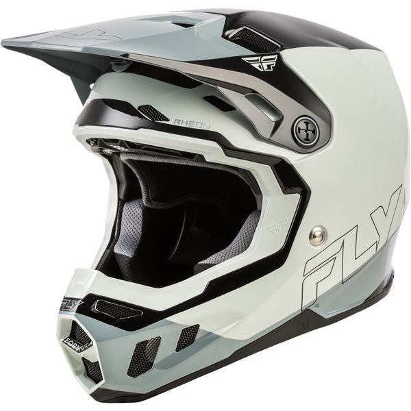 Studio view of  fly racing , in grey and light grey and black, protective shell, on a white studio background, for motocross / off‑road use, | Fly Racing - Formula CC Glide Helmet | SKU 73-4352 | Colors: Purlpe/Stone/Black, Grey/Light Grey/Black, Blue/Light Grey/Grey, Black/Red/Grey | Sizes: XS to 2X | Available at BTO Sports