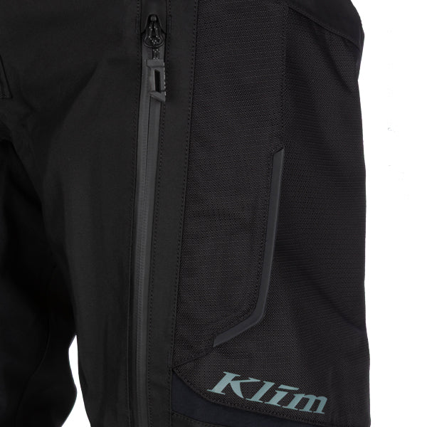 Studio photo on a white background of Klim Badlands Pro Pants; showing panel layout, seams, and overall cut; SKU 4053-004-028-000