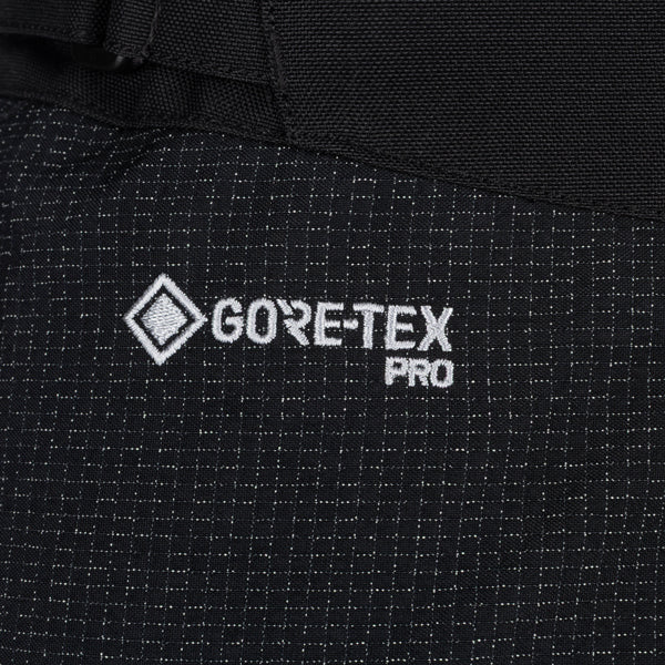 Studio photo on a white background of Klim Badlands Pro A3 Pants; showing panel layout, seams, and overall cut; SKU 4102-002-030-000