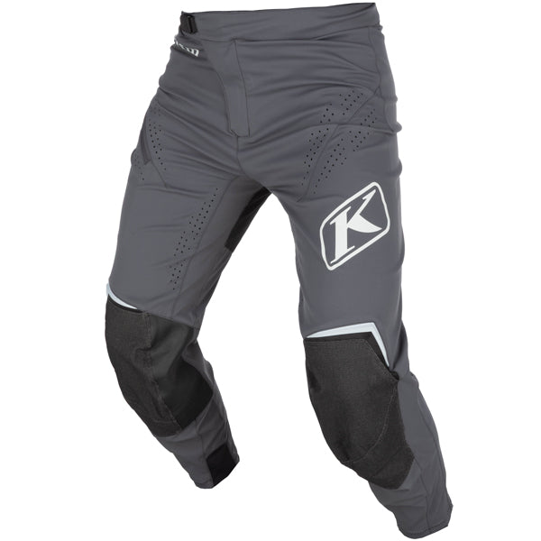 Professional studio photo of Klim XC Pro Pants; showing panel layout, seams, and overall cut; SKU 5021-001-028-360; Colors: Oil Green, Asphalt