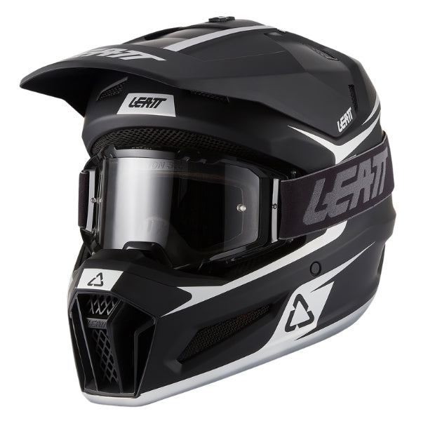 Leatt Moto 3.5 motocross helmet kit in Black, front-left angle showing the peak and chin guard with included goggles