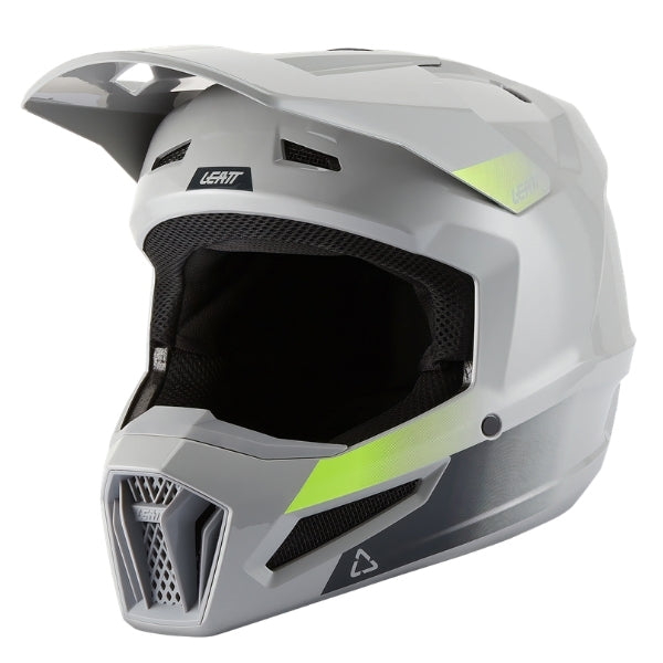 Leatt Moto 2.5 motocross helmet in Grey, front-left angle showing the peak and chin guard