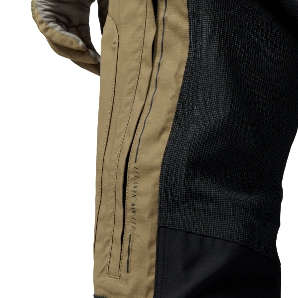 Leatt Moto 6.5 HydraDri Pants in Tactic Khaki Brown, close-up of the side-leg zipper and stretch panel