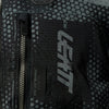 Leatt Moto 5.5 Enduro Jacket in Camo Black, close-up of the chest zipper and hydration clip point