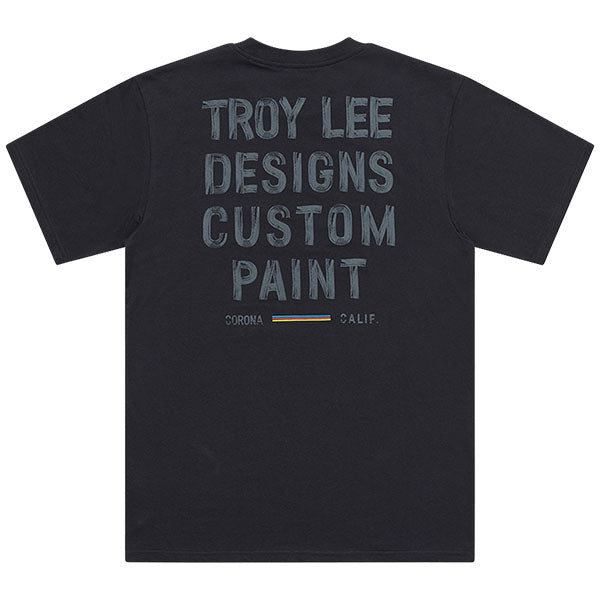 High-resolution studio image of Troy Lee Designs Paint Shop Tee; showing tee fit, printed graphics, and crew neckline; SKU 7017290; Colors: Carbon, White