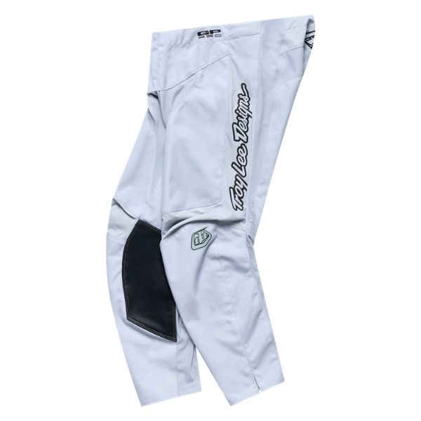 Troy Lee Designs GP Pro Mono pants in Titanium, full-length front view showing the leg graphics and protective knee panels