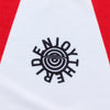 Close-up of a unique circular 'ENJOYTHERIDE' graphic on the chest of a Troy Lee Designs (TLD) GP Pro motocross jersey in White/Red. SKU: 377262022 | SKU:  | Available at BTO Sports