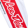 Close-up of the sleeve of a Troy Lee Designs GP Pro jersey in White/Red, showing the large 'Lee Designs' graphic on a red stripe. SKU: 377262022 | SKU:  | Available at BTO Sports