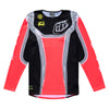 A full-length, front-facing product shot of the Troy Lee Designs SE PRO JERSEY in the infrared/black colorway. The long-sleeve motocross jersey is primarily black with a large, vibrant red-orange 