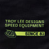 A close-up shot of the Troy Lee Designs Youth SE PRO JERSEY in infrared/black. With a 